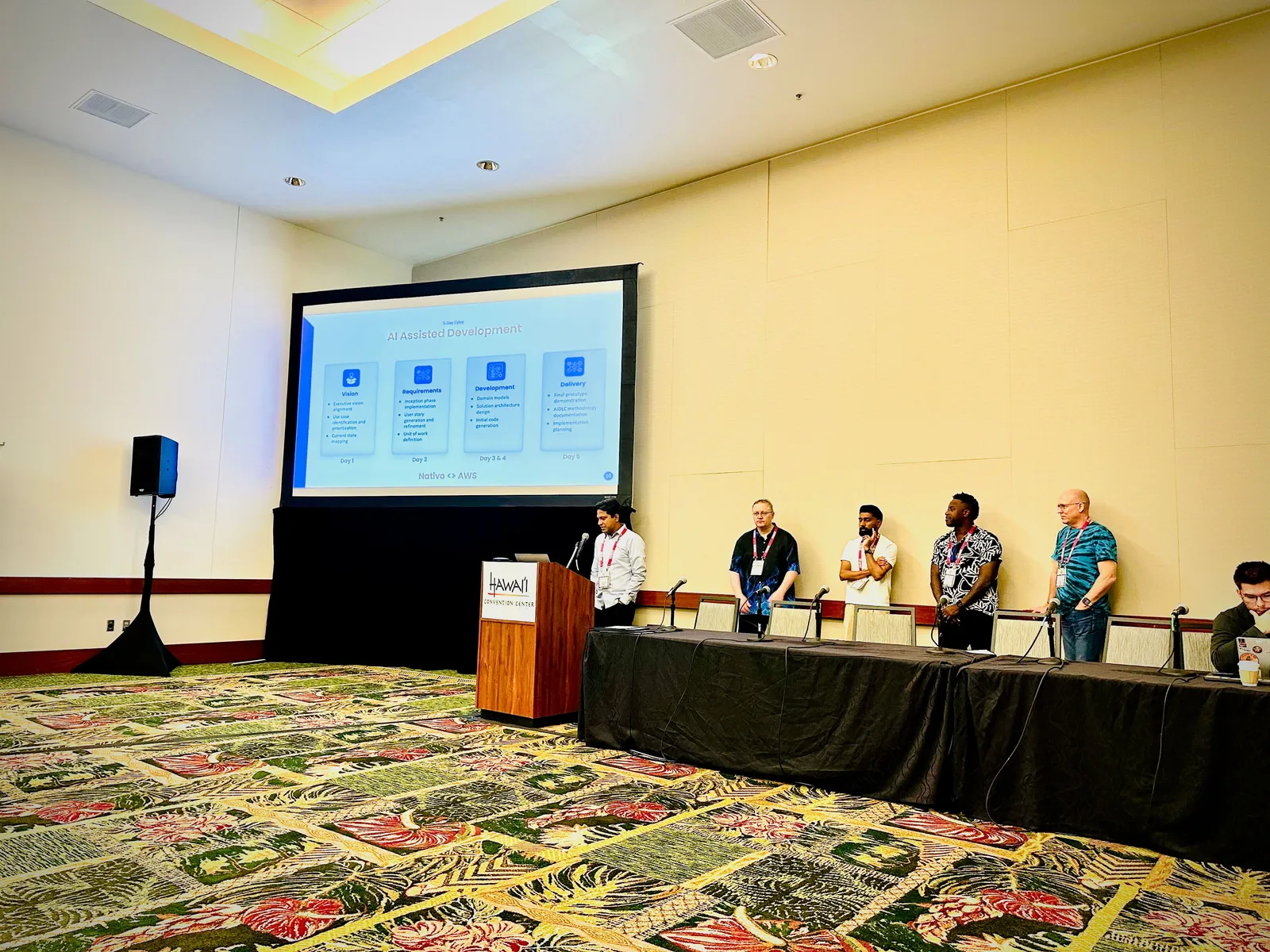 The CVAM workshop session room in Honolulu, with Ganesh Raam at the podium and the speaker panel